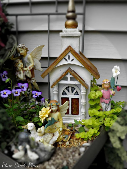 Fairy Garden 2015 made from thrift store finds.