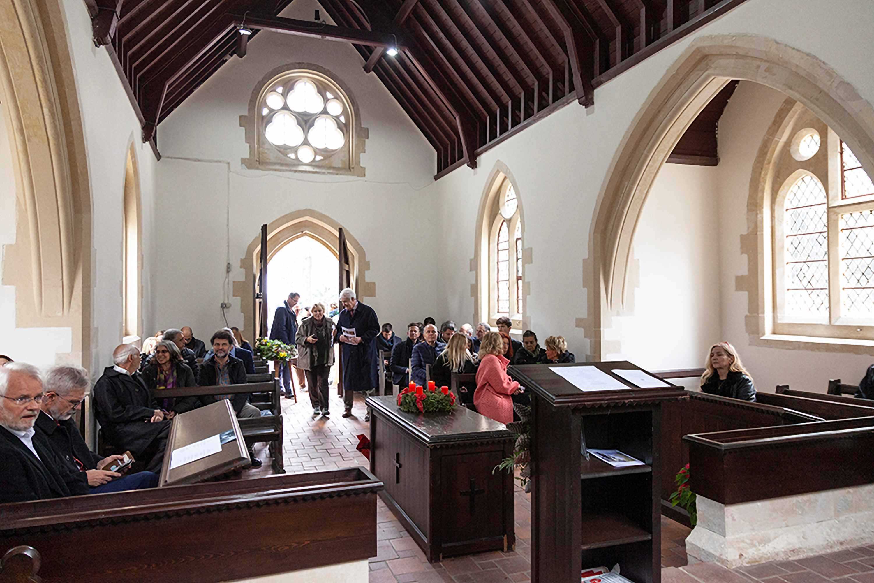 Guests convene in the chapel.