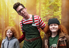 Chill Factore grotto helper elf who is very tall and looks like arthur christmas with my two boys