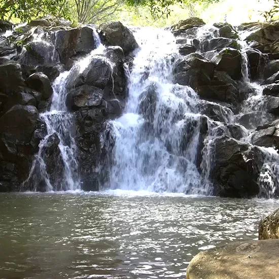 Cascading Waterfall Over Rocks -Mauritius Wallpaper Engine