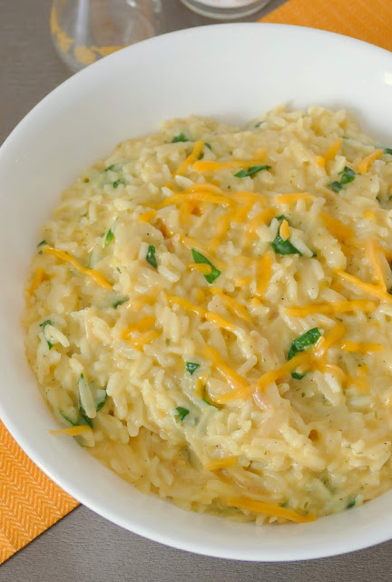 A delicious and easy side that's great served with chicken, beef or fish! Tons of flavor and ready in less than 20 minutes! Cheesy Spinach Rice and Orzo Recipe