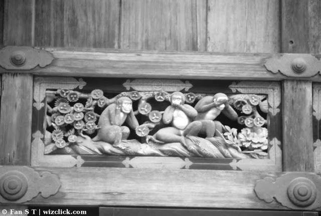 Monochrome image of the three wise monkeys