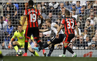 Harry Kane curls the ball into the bottom left corner on his return to the starting XI for Tottenham at White Hart Lane