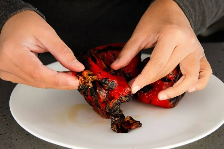 Peel off the membrane of Charred capsicum