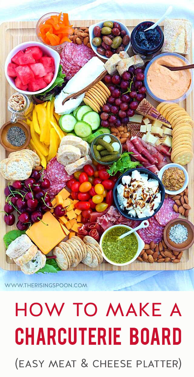 Need an easy & eye-catching no-cook appetizer for summer parties, a backyard BBQ, holidays (like Memorial Day, Fourth of July & Labor Day), camping & picnics? Learn how to assemble a simple charcuterie board (meat & cheese tray) with seasonal ingredients in 30 minutes. This one features cured meats, hard and soft cheeses, fresh produce like grapes, watermelon, cucumber & heirloom tomatoes, plus sweet & savory nibbles so there's a variety of flavors. Keep reading for lots of ideas & tips!