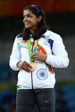 Wrestler Sakshi Malik wins India's First Medal