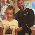 Dad makes daughter wear t-shirt with his face on it to scare off boys
