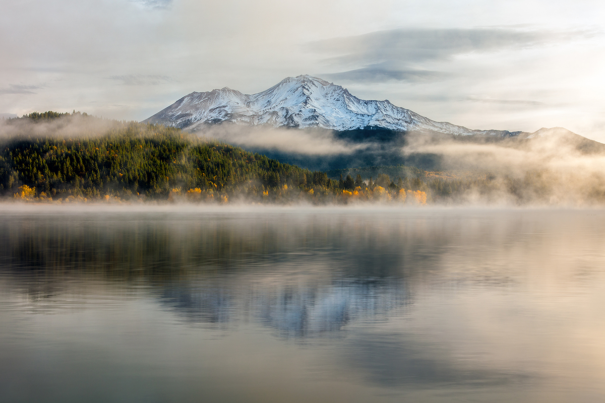 This is an image of Mt. Shasta overlooking the Siskiyou Lake