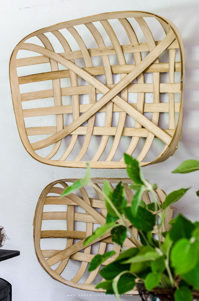 Pair of tobacco baskets on wall