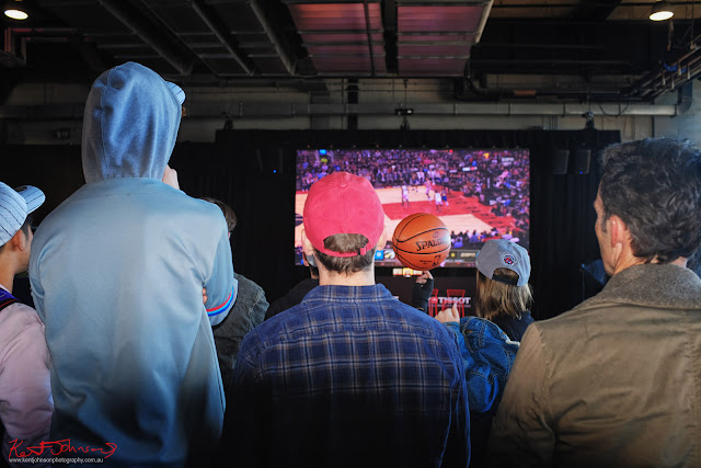 Guests watching the big screen for the Raptors VS Warriors game at the TISSOT NBA Finals Party Sydney - Photography by Kent Johnson.