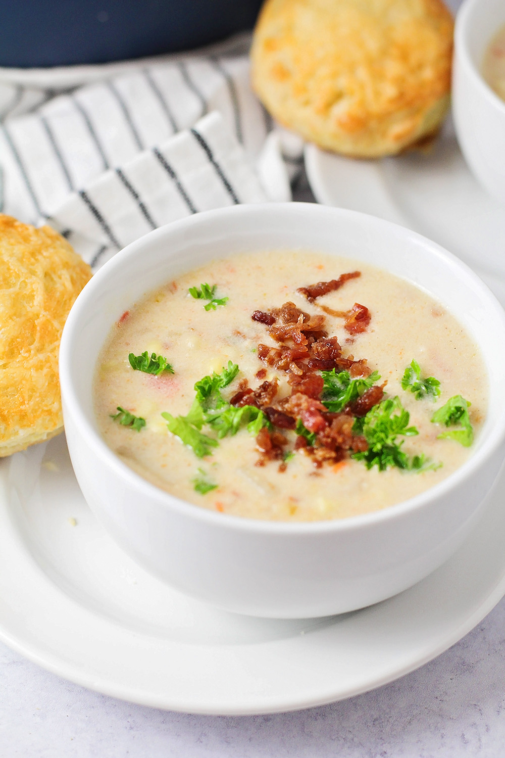 This Instant Pot summer corn chowder is a great way to enjoy a tasty soup without heating up the whole house! It's simple to make and so delicious!