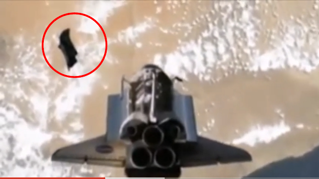 This is the shuttle near the black Knight Satellite UFO.