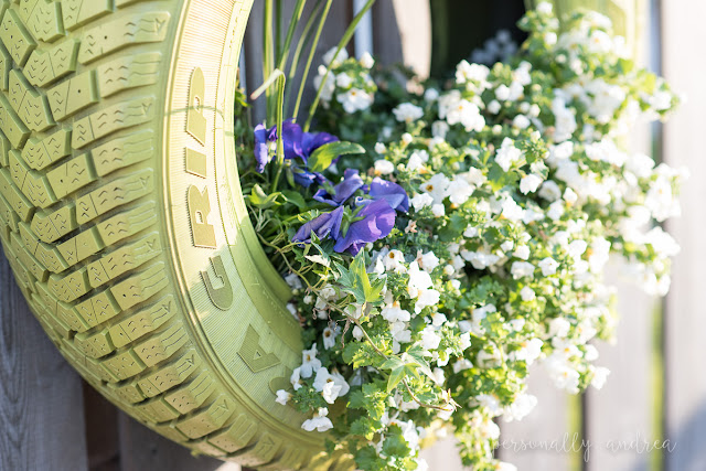 How to love your suburban backyard.  My tips for making the most of your space and living in it throughout the summer. Spray paint an old tire and use as a planter.