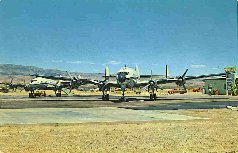 Two Lake Havasu City airliners are parked on the ramp about 1965 with the 