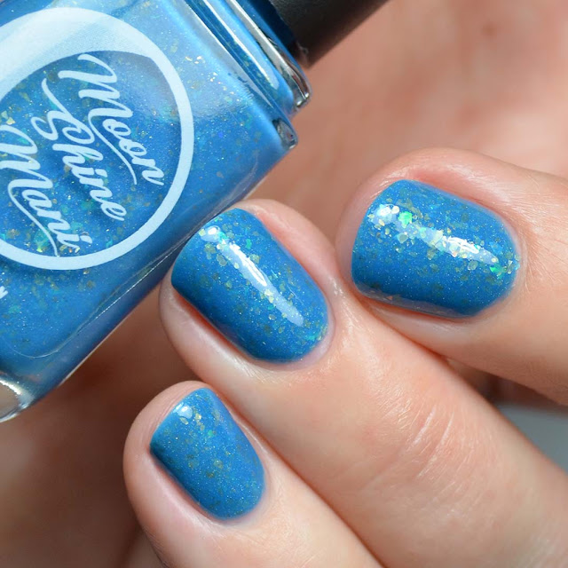 blue nail polish with flakies