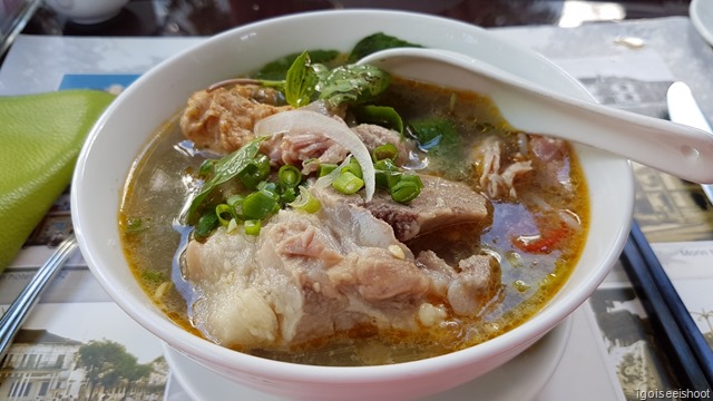 Hue’s signature rice noodle soup (Bun Bu Hue) with sliced beef and tasty broth made from hours of simmering chunks of pork leg. 