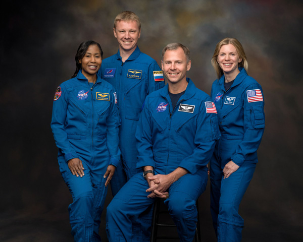 The astronauts who will fly on SpaceX's Crew-9 mission this summer: NASA astronaut Stephanie Wilson, Roscosmos cosmonaut Aleksandr Gorbunov, and NASA astronauts Nick Hague and Zena Cardman.