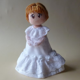 Doll in white dress