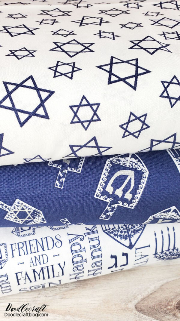 Supplies Needed to Celebrate Hanukkah:  Hanukkah themed fabric Bunting Menorah (actually, a Hanukiah) Dreidels Printable Dreidel Instructions Candy (Gelt) Striped Cake (from Something Special Custom Cakes) Star of David Cake Topper  This Complete Hanukah set is what I've got!