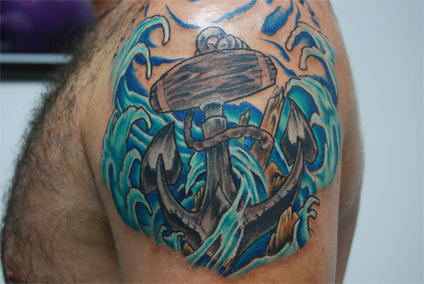 Anchor with splashing waves of water tattoo