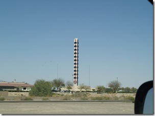 The worlds largest thermometer somewhere in the dessert.