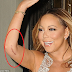 Mariah Carey reveals large scar from her recent arm injury (Photos)