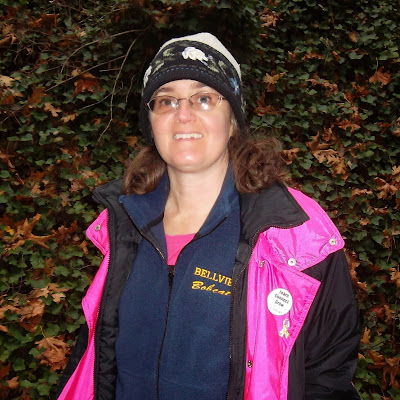 Cynthia Parkhill wearing "Bellview Bobcats" zip-up fleecy vest