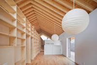 Contemporary House Style With Exposed Timber Rafter And Bookshelf Column