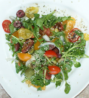 Watercress salad with hemp seeds and olives