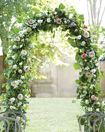 To inexpensively embellish an arch go heavy on the foliage