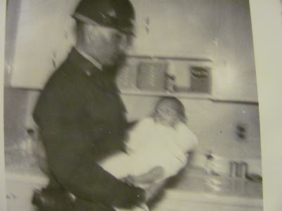 Steven E. Streight held by father William E. Streight as baby at Fort Knox, Kentucky army hospital