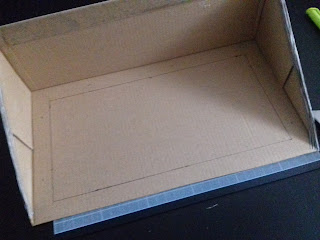 Tracez un rectangle dans le fond de la boîte 