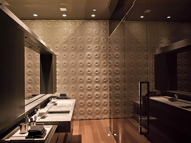 Picture of modern luxury bathroom with dark brown furniture