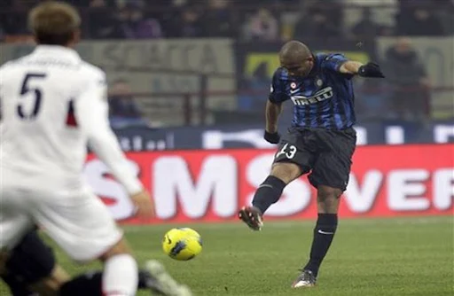 Inter Milan player Maicon shoots from long range to score against Genoa