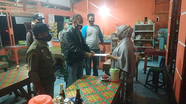 Sampaikan perpanjanngan PPKM, Polsek Sipispis Himbau Pelaku Usaha dan Warga