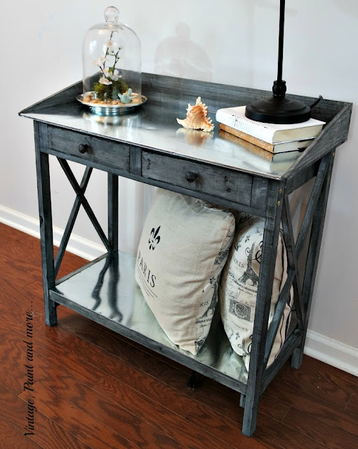 rustic vintage potting bench used as a table in an vintage industrial setting