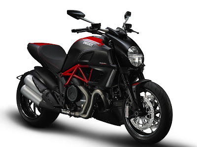 NEW  DUCATI  MOTORCYCLE  2011  DIAVEL  CARBON  FRONT  ACTION  VIEW