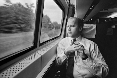 photo of Joe Biden commuting on a train in 1988. By Joe McNally.