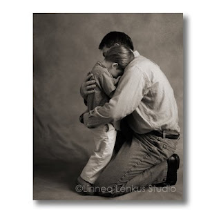 father_and_son_hugging