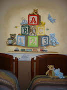 I added a cartoon plane, a bear holding a block, a bear holding up a block . (baby boy murals)