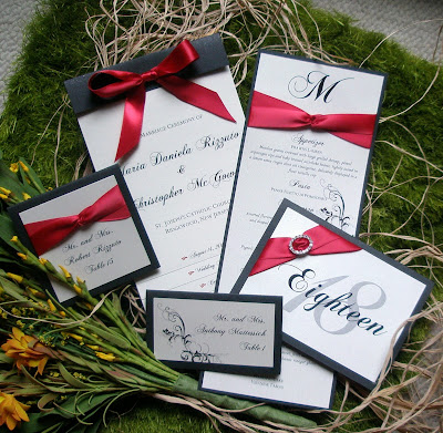 We were excited to incorporate her wedding colors of Black Red and Ivory 