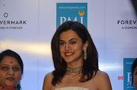 Tapsee Pannu looks Beautiful in White Sleeveless Gown Exclusive  Pics 02.jpg