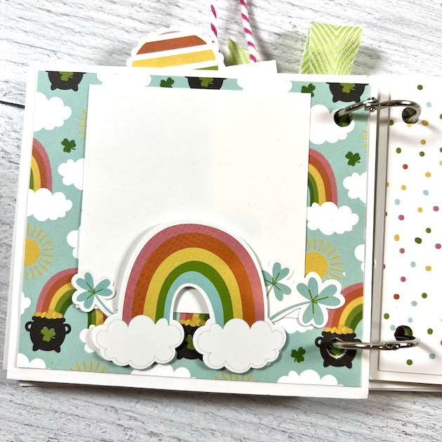 Spring St. Patrick's Day Scrapbook Album page with colorful rainbows, clouds, pots of gold, and shamrocks
