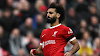 Salah's double-goal victory puts Liverpool on top