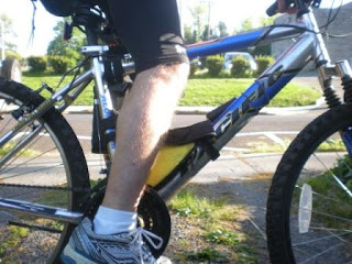 Correct leg position (or seat height) on bicycle.  Note the slight bend in the leg.