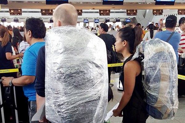 TANIM-BALA EFFECT? Some Pinoys, foreigners sealed their baggage at NAIA