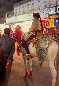 Bridegroom on a horse