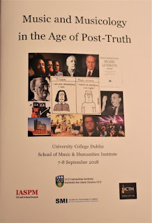 Program booklet for the conference, featuring a collage of images alluding to several of the different topics covered by the papers.