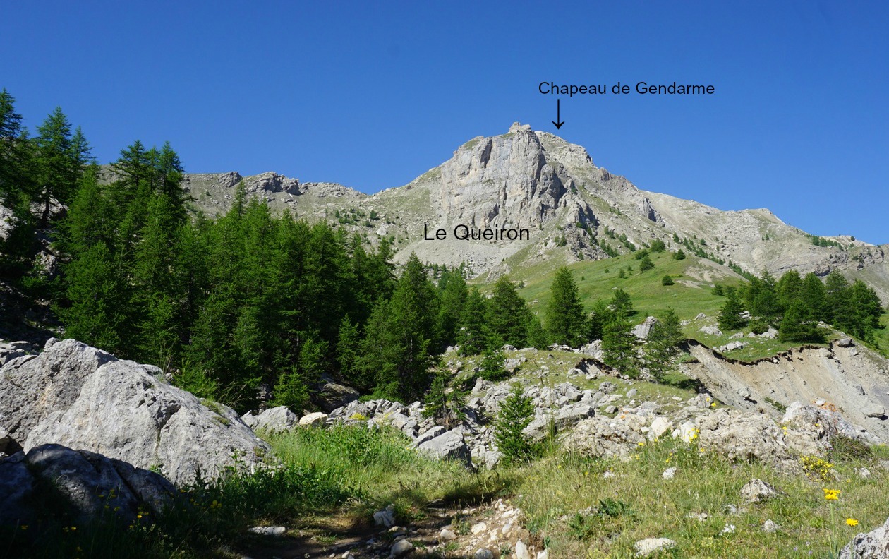 Chapeau de Gendarme behind Le Queiron wall