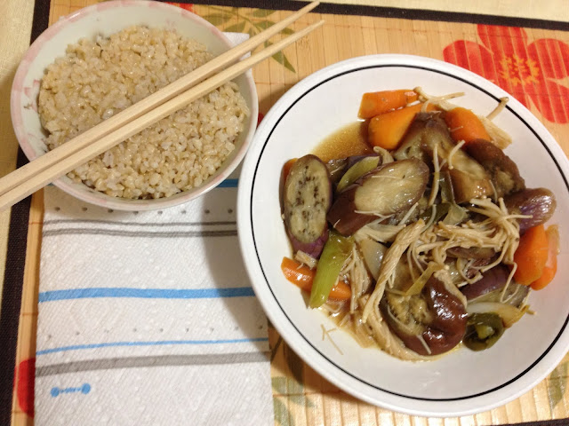 Eggplant and enoki mushroom with carrots and bulb onion.